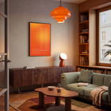 Amber Glow · True Wealth. Interior photo with a 50 × 70 cm poster in a black frame.