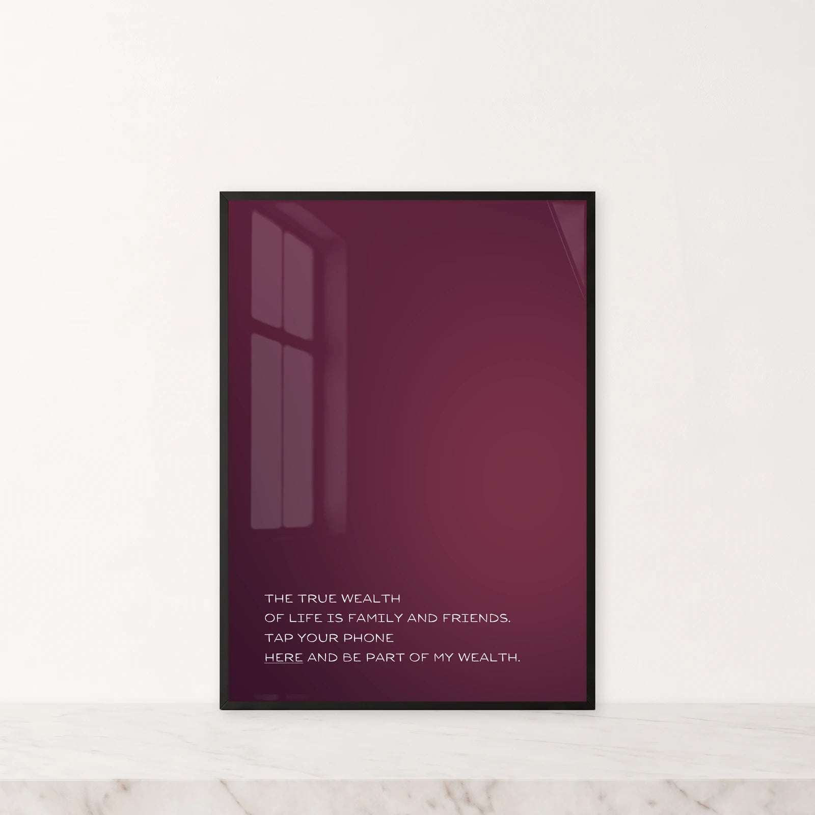 Bordeaux Glow · True Wealth. Reference photo: 50 × 70 cm in a black frame on light marble.