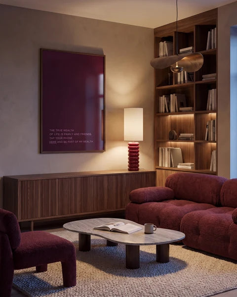 Velvet Library · MagicPoster in a coordinated interior, filling the frame edge to edge with visible light reflections.